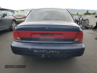 1998 Saturn SL z VIN 1G8ZK5277WZ174641, wystawiony jako Copart lot #54620995 z przebiegiem 109 742 mil mil oraz Szkody całkowita. Historia ofert i sprzedaży dostępna na DreamBid. Obrazek 6.