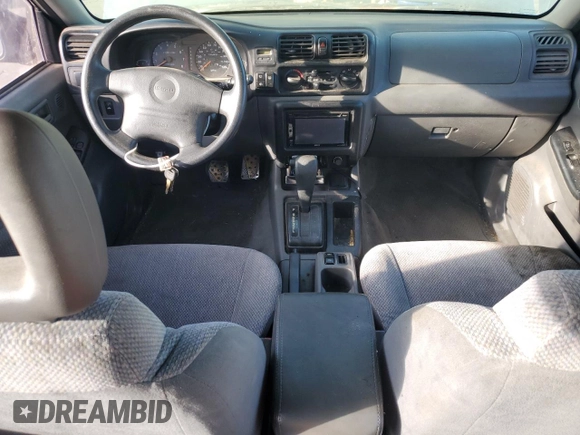 1999 Isuzu Rodeo S with VIN 4S2CK58W1X4349947, listed as a Copart auction lot 84634064 with 135,851 mi miles and Clean Title. Bid and sale history available at DreamBid. Image 8.
