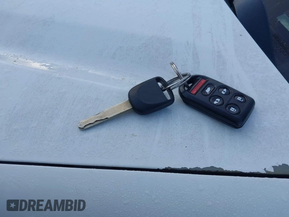 2009 Honda Odyssey EX-L with VIN 5FNRL38799B404379, listed as a IAAI auction lot 41990398 with 224,859 mi miles and . Bid and sale history available at DreamBid. Image 11.