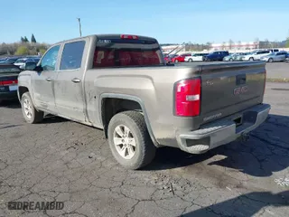 2015 GMC Sierra 1500 SLE with VIN 3GTU2UEC2FG309656, listed as a IAAI auction lot 41922877 with 194,339 mi miles. Bid and sale history available at carsss.com. Image 3.