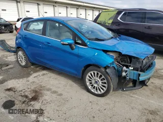 2015 Ford Fiesta Titanium z VIN 3FADP4FJ7FM120958, wystawiony jako Copart lot #85260204 z przebiegiem 144 587 mil mil oraz Szkoda całkowita • Salvage title. Historia ofert i sprzedaży dostępna na DreamBid. Obrazek 4.