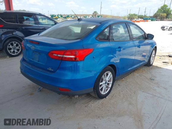 2015 Ford Focus SE with VIN 1FADP3F2XFL354354, listed as a IAAI auction lot 42183319 with 102,232 mi miles and . Bid and sale history available at carsss.com. Image 4.