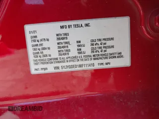 2021 Tesla Model Y Standard Range with VIN 5YJYGDED1MF111410, listed as a IAAI auction lot 41942323 with 24,836 mi miles. Bid and sale history available at carsss.com. Image 9.