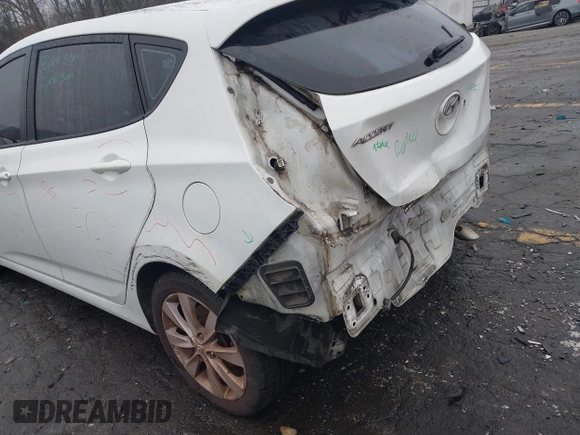 2014 Hyundai Accent SE with VIN KMHCU5AE8EU145629, listed as a IAAI auction lot 41497848 with 134,919 mi miles. Bid and sale history available at carsss.com. Image 13.