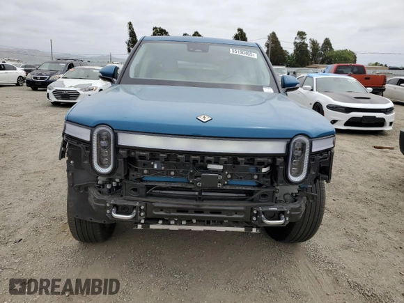 2023 Rivian R1T Launch Edition with VIN 7FCTGAAL7PN019188, listed as a Copart auction lot 55100405 with 13,654 mi miles and Salvage Title. Bid and sale history available at DreamBid. Image 5.