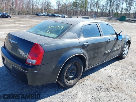 2005 Chrysler 300 with VIN 2C3JA43R25H600920, listed as a IAAI auction lot 41863216 with 1 mi miles. Bid and sale history available at carsss.com. Image 4.