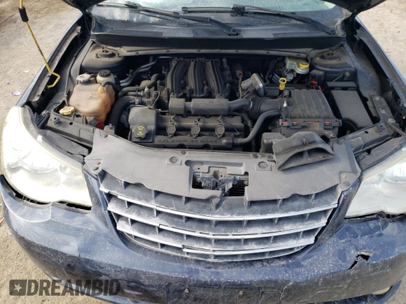 2008 Chrysler Sebring Touring z VIN 1C3LC55R88N145038, wystawiony jako Copart lot #57938415 z przebiegiem 120 291 mil mil oraz Szkoda całkowita • Salvage title. Historia ofert i sprzedaży dostępna na DreamBid. Obrazek 11.