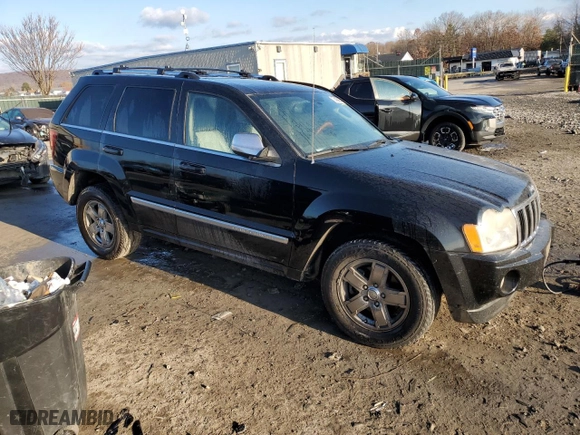 2006 Jeep Grand Cherokee Overland with VIN 1J8HR68256C334929, listed as a Copart auction lot 79450964 with 184,944 mi miles and Salvage Title. Bid and sale history available at carsss.com. Image 4.