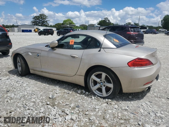 2012 BMW Z4 sDrive28i с VIN WBALL5C50CE716958, выставлен на аукционе Copart как лот 56932865 с пробегом 99 523 миль миль и Чистый • Clean title. История ставок и продаж доступна на DreamBid. Изображение 2.