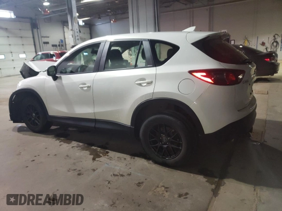 2016 Mazda CX-5 Sport with VIN JM3KE2BE2G0828003, listed as a Copart auction lot 81482614 with 190,993 mi miles and Salvage Title. Bid and sale history available at DreamBid. Image 2.