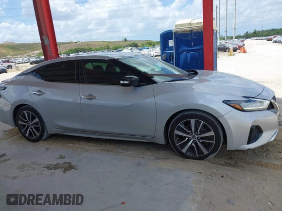 2020 Nissan Maxima SV z VIN 1N4AA6CV6LC366887, wystawiony jako IAAI lot #41952159 z przebiegiem 100 182 mil mil oraz . Historia ofert i sprzedaży dostępna na DreamBid. Obrazek 13.