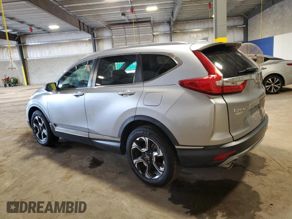 2018 Honda CR-V Touring z VIN 7FARW2H95JE012947, wystawiony jako Copart lot #64779925 z przebiegiem 20 561 mil mil oraz Szkoda całkowita • Salvage title. Historia ofert i sprzedaży dostępna na DreamBid. Obrazek 2.