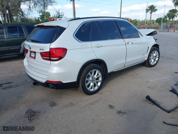 2016 BMW X5 xDrive35i with VIN 5UXKR0C54G0P27141, listed as a IAAI auction lot 41553602 with 61,947 mi miles. Bid and sale history available at carsss.com. Image 4.