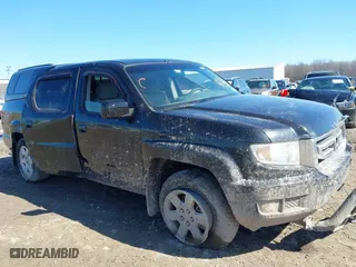 2011 Honda Ridgeline RTS with VIN 5FPYK1F48BB005889, listed as a IAAI auction lot 41761367 with 146,974 mi miles. Bid and sale history available at carsss.com. Image 13.