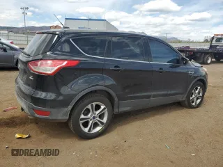 2015 Ford Escape SE with VIN 1FMCU9G96FUC65061, listed as a Copart auction lot 53571625 with 129,048 mi miles and Salvage Title. Bid and sale history available at carsss.com. Image 3.