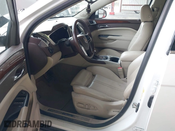 2015 Cadillac SRX Luxury Collection with VIN 3GYFNEE30FS567431, listed as a IAAI auction lot 42118084 with 140,778 mi miles. Bid and sale history available at carsss.com. Image 5.