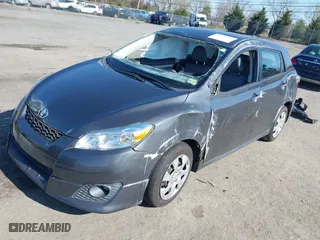 2010 Toyota Matrix with VIN 2T1KU4EE6AC385760, listed as a IAAI auction lot 41929939 with 209,599 mi miles. Bid and sale history available at carsss.com. Image 2.
