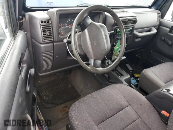 2002 Jeep Wrangler X z VIN 1J4FA39S32P767598, wystawiony jako Copart lot #55974555 z przebiegiem 177 793 mil mil oraz Czysty tytuł • Clean title. Historia ofert i sprzedaży dostępna na DreamBid. Obrazek 8.
