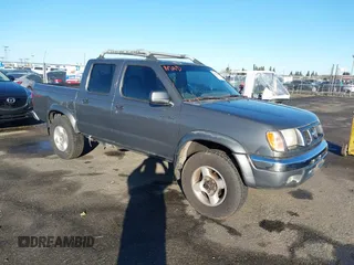 2000 Nissan Frontier XE z VIN 1N6ED27Y1YC360080, wystawiony jako IAAI lot #41515272 z przebiegiem 344 488 mil mil oraz . Historia ofert i sprzedaży dostępna na DreamBid. Obrazek 1.