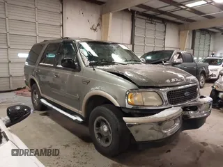 1999 Ford Expedition XLT z VIN 1FMPU18LXXLB47700, wystawiony jako IAAI lot #41592004 z przebiegiem Nie podano mil oraz . Historia ofert i sprzedaży dostępna na DreamBid. Obrazek 1.