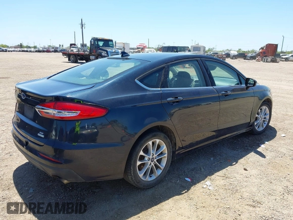 2020 Ford Fusion SE with VIN 3FA6P0HD8LR111256, listed as a IAAI auction lot 42032725 with 98,822 mi miles. Bid and sale history available at carsss.com. Image 4.