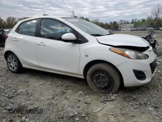 2014 Mazda 2 Sport with VIN JM1DE1KY3E0181629, listed as a Copart auction lot 51043475 with 107,849 mi miles and Salvage Title. Bid and sale history available at carsss.com. Image 4.
