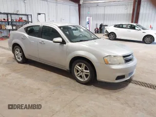 2012 Dodge Avenger SXT with VIN 1C3CDZCB5CN219812, listed as a IAAI auction lot 41928110 with 200,557 mi miles and . Bid and sale history available at carsss.com. Image 1.