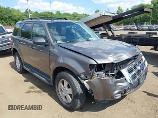 2012 Ford Escape XLT with VIN 1FMCU9D75CKC22907, listed as a IAAI auction lot 42571195 with 198,537 mi miles and . Bid and sale history available at DreamBid. Image 17.