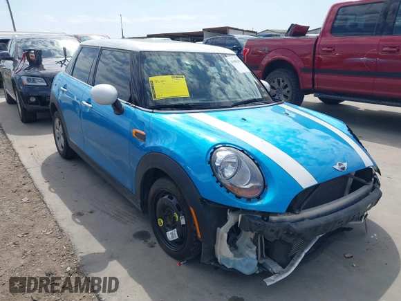 2017 MINI Hardtop 4 Door Cooper with VIN WMWXU1C53H2E17614, listed as a IAAI auction lot 41686204 with 53,409 mi miles and . Bid and sale history available at DreamBid. Image 1.