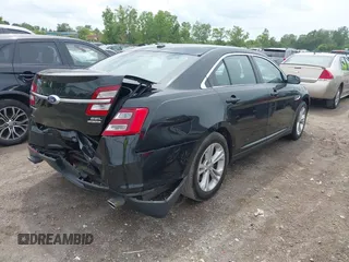 2015 Ford Taurus SEL with VIN 1FAHP2E80FG192017, listed as a IAAI auction lot 42562853 with 124,348 mi miles and . Bid and sale history available at DreamBid. Image 4.