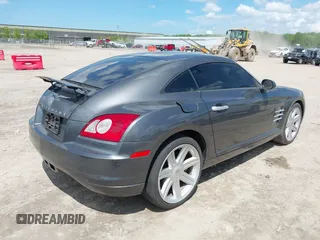 2004 Chrysler Crossfire z VIN 1C3AN69L24X011377, wystawiony jako IAAI lot #42256439 z przebiegiem Nie podano mil oraz . Historia ofert i sprzedaży dostępna na DreamBid. Obrazek 4.