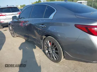 2020 Infiniti Q50 Red Sport 400 with VIN JN1FV7AR8LM660823, listed as a IAAI auction lot 40322341 with 104,530 mi miles and . Bid and sale history available at carsss.com. Image 14.