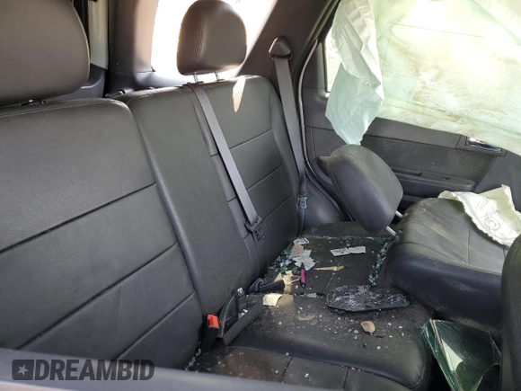 2010 Ford Escape Limited with VIN 1FMCU9EG5AKD32965, listed as a Copart auction lot 59765695 with Not provided miles and Salvage title. Bid and sale history available at DreamBid. Image 11.