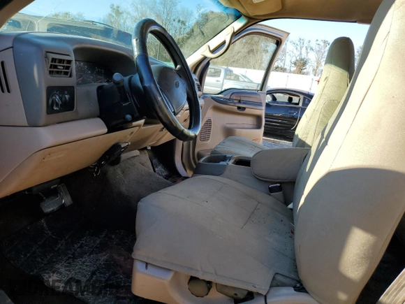 1999 Ford F-250 XL with VIN 1FTNX20F9XEE66766, listed as a Copart auction lot 46595795 with 571,503 mi miles and Salvage title. Bid and sale history available at DreamBid. Image 7.