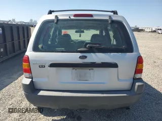 2002 Ford Escape XLS Choice with VIN 1FMYU02112KB00947, listed as a Copart auction lot 48948855 with 223,287 mi miles and Salvage title. Bid and sale history available at DreamBid. Image 6.