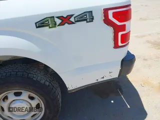 2018 Ford F-150 XL with VIN 1FTFX1E5XJKD86996, listed as a IAAI auction lot 42256819 with 141,798 mi miles and . Bid and sale history available at DreamBid. Image 6.