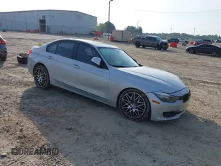 2013 BMW 3 Series 328i with VIN WBA3C1C54DK103415, listed as a IAAI auction lot 42147590 with 113,188 mi miles and . Bid and sale history available at carsss.com. Image 1.