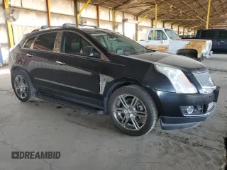 2012 Cadillac SRX Premium Collection z VIN 3GYFNFE30CS599863, wystawiony jako Copart lot #61249995 z przebiegiem 144 740 mil mil oraz Czysty tytuł • Clean title. Historia ofert i sprzedaży dostępna na DreamBid. Obrazek 4.
