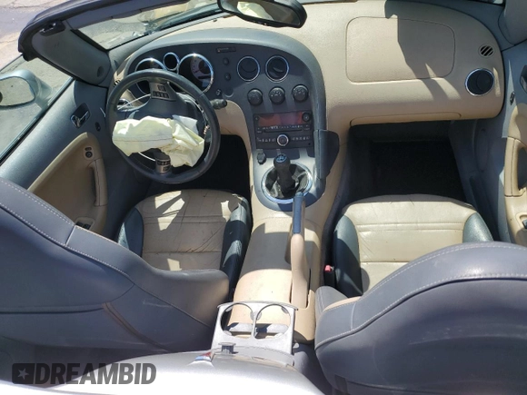 2007 Pontiac Solstice z VIN 1G2MB35B87Y131331, wystawiony jako Copart lot #53976805 z przebiegiem 183 659 mil mil oraz Szkoda całkowita • Salvage title. Historia ofert i sprzedaży dostępna na DreamBid. Obrazek 8.