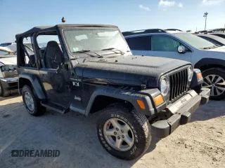 2002 Jeep Wrangler X with VIN 1J4FA39S62P775517, listed as a Copart auction lot 75336364 with Not Provided miles and Salvage Title. Bid and sale history available at carsss.com. Image 4.