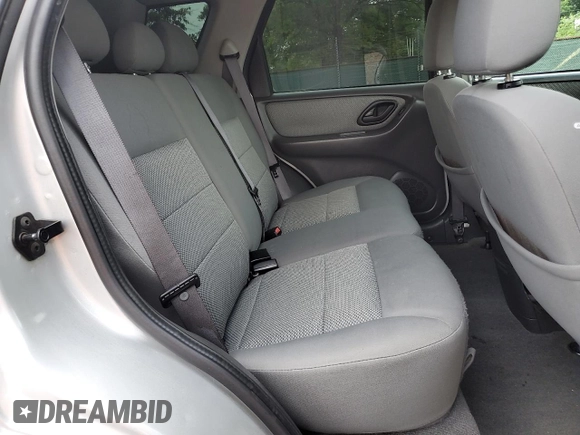 2005 Ford Escape Hybrid with VIN 1FMCU96H55KC74059, listed as a Copart auction lot 57065685 with 154,807 mi miles and Salvage title. Bid and sale history available at DreamBid. Image 11.