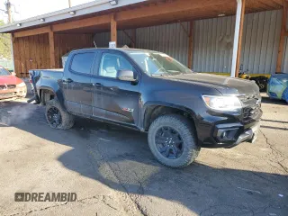 2022 Chevrolet Colorado 4WD Z71 with VIN 1GCGTDENXN1273532, listed as a Copart auction lot 57910055 with 36,223 mi miles and Salvage title. Bid and sale history available at DreamBid. Image 4.