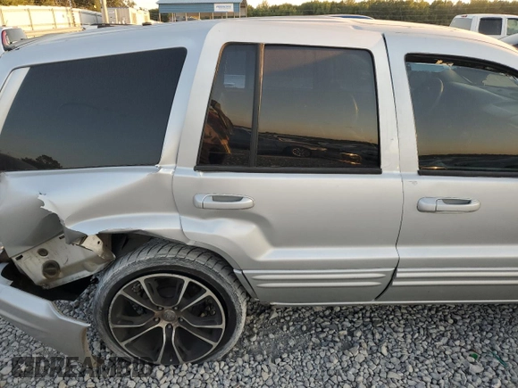 2004 Jeep Grand Cherokee with VIN 1J8GX58J54C284761, listed as a Copart auction lot 75614854 with 182,188 mi miles and Salvage title. Bid and sale history available at DreamBid. Image 11.