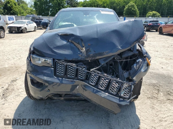 2018 Jeep Grand Cherokee Altitude with VIN 1C4RJFAGXJC267021, listed as a Copart auction lot 58762945 with 93,347 mi miles and Salvage title. Bid and sale history available at DreamBid. Image 5.