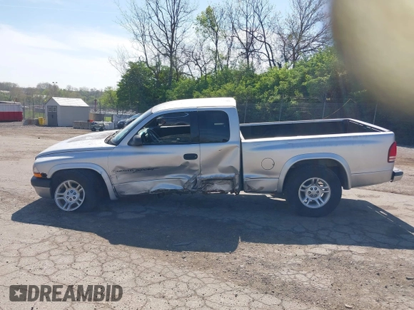 2001 Dodge Dakota SLT with VIN 1B7GG22XX1S348751, listed as a IAAI auction lot 42077395 with 148,034 mi miles and . Bid and sale history available at carsss.com. Image 15.