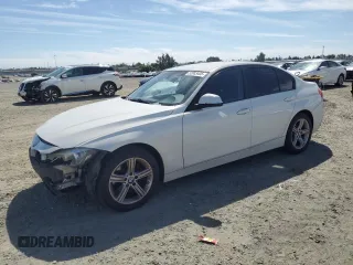 2015 BMW 3 Series 320i with VIN WBA3B1C52FK136581, listed as a Copart auction lot 52803405 with 138,495 mi miles and Salvage Title. Bid and sale history available at carsss.com. Image 1.
