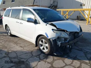 2014 Toyota Sienna LE AAS with VIN 5TDKK3DC2ES483679, listed as a IAAI auction lot 41547261 with 142,697 mi miles. Bid and sale history available at carsss.com. Image 1.