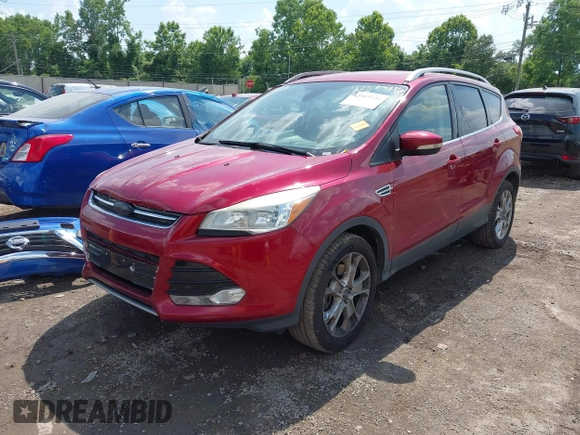 2015 Ford Escape Titanium z VIN 1FMCU9J91FUC58933, wystawiony jako IAAI lot #42583736 z przebiegiem 147 359 mil mil oraz . Historia ofert i sprzedaży dostępna na DreamBid. Obrazek 2.
