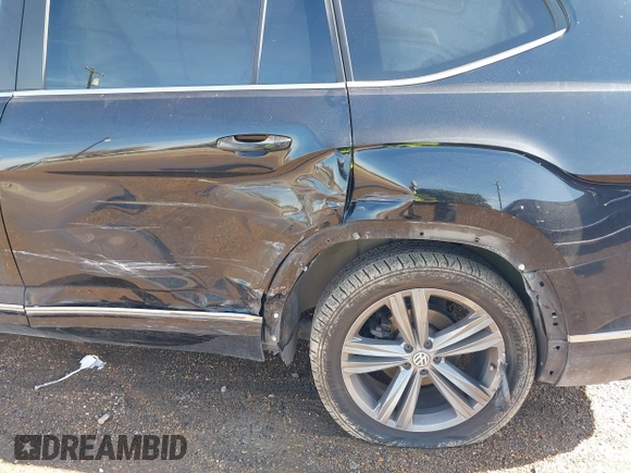 2018 Volkswagen Atlas SE with VIN 1V2FR2CA9JC537903, listed as a IAAI auction lot 41386874 with 118,764 mi miles and . Bid and sale history available at DreamBid. Image 6.