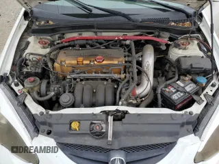 2002 Acura RSX Auto with VIN JH4DC548X2C034663, listed as a Copart auction lot 55980275 with 165,809 mi miles and Salvage title. Bid and sale history available at DreamBid. Image 11.
